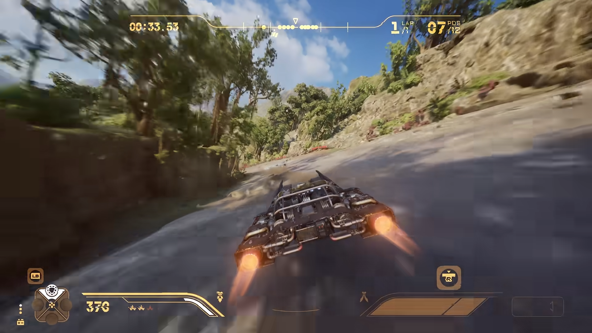Landspeeder viewed from behind while racing along a paved canyon road in IGN’s Galactic Racer review